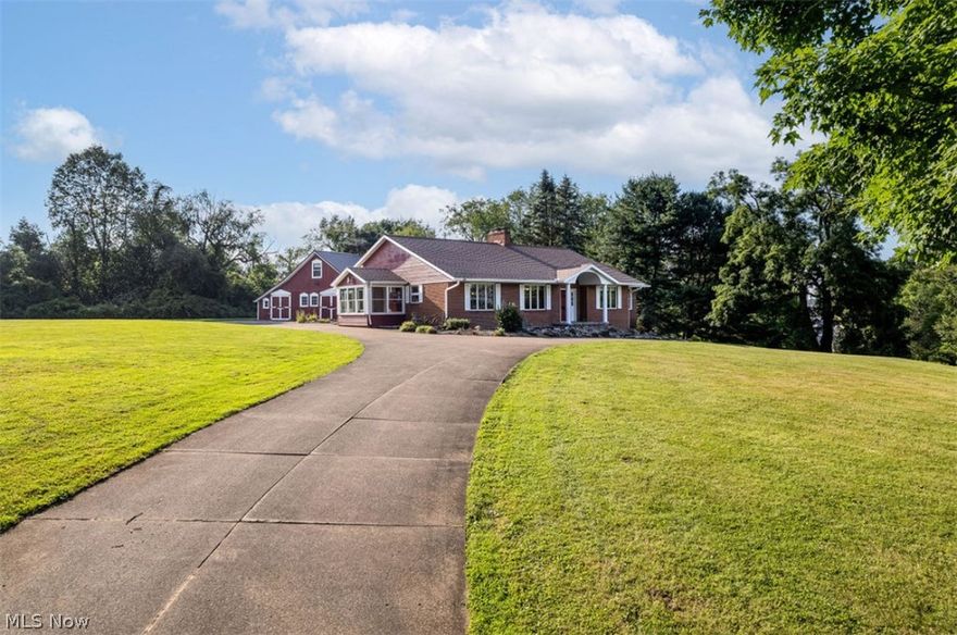 Welcome Home to this custom-Built family-owned Brick ranch. AS you enter this home you will love the stately entrance with water feature, landscaping and circular driveway for easy access. Living room has gorgeous, curved fireplace and room opens up into 4 season room for all year enjoyment. Dining room is extra-large for all family gatherings as this family did every year. Large owner suite with doors to same 4 season room and double closets. 2 additional bedrooms on this 1st floor, laundry room and 1/2 bath. Kitchen is graciously sized for all your cooking and entertaining of your liking. The views from every window in this house are amazing and don't let me forget to tell you that you are right across from Loyal Oak Golf Course. Walk down wide spiral staircase to basement which consist of rec room and full bath and entrance to 2 car garage. Outside you will enjoy very private yard with 2.51 acres and the barn that used to be on property of golf course across the street, sellers used to store the many antiques in. This property is fun and as you walk through you can't stop but think of all the memories that were made here and what memories you what to make yourself starting today. Call for your private showing.
