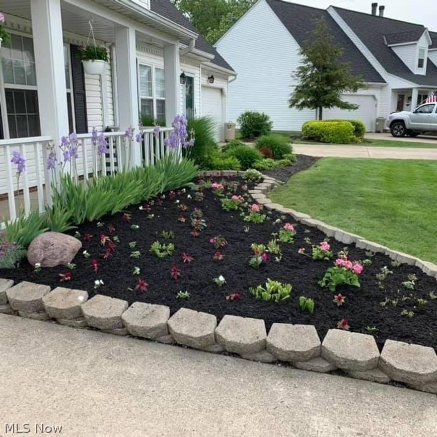 Beautiful 4 bedroom 3 bathroom townhouse in Smuggler's Cove. Freshly painted, carpets just cleaned and move-in READY! 1st floor bedroom and bathroom, sunroom, attached garage, eat-in kitchen, and living room + family room! LOW MAINTENANCE $265 monthly HOA includes landscaping, snow removal, trash, water, sewer, roof replacement every five years, gutter cleaning, and dryer duct cleaning! DO NOT MISS THIS OPPORTUNITY to make this huge townhouse, with spectacular wooded view YOURS! This is where you want to be! Call or text listing agent to view!