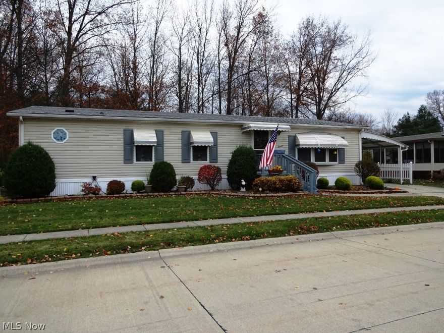 Wow! If you love privacy and a spacious home, this one is for you. This home is located on a great street in Columbia Park. There is a beautiful 3/4 season enclosed sun room, same level, which overlooks the woods. Great floor plan featuring 2 bedrooms, 2 baths, formal living and dining rooms, great kitchen and laundry. Come and take a look for yourself! Columbia Park is an age-specific community. Sale is subject to Park approval. Pet restrictions. HOA is monthly lot rental fee.