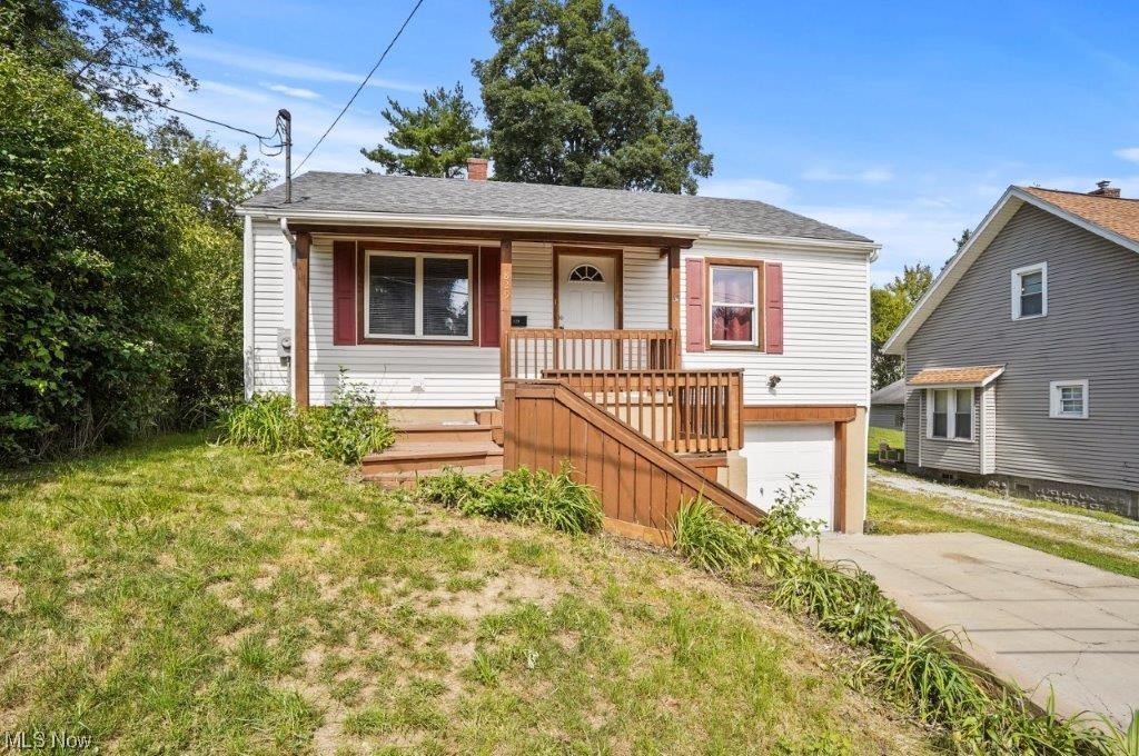Cute and affordable ranch in the heart of Barberton! This home features newer flooring throughout, new ceiling fan in the living room, new roof, and attached garage! You will surely love this little gem the minute you walk through the door! Call your favorite real estate professional today and schedule your private showing! This home is priced to sell so hurry!