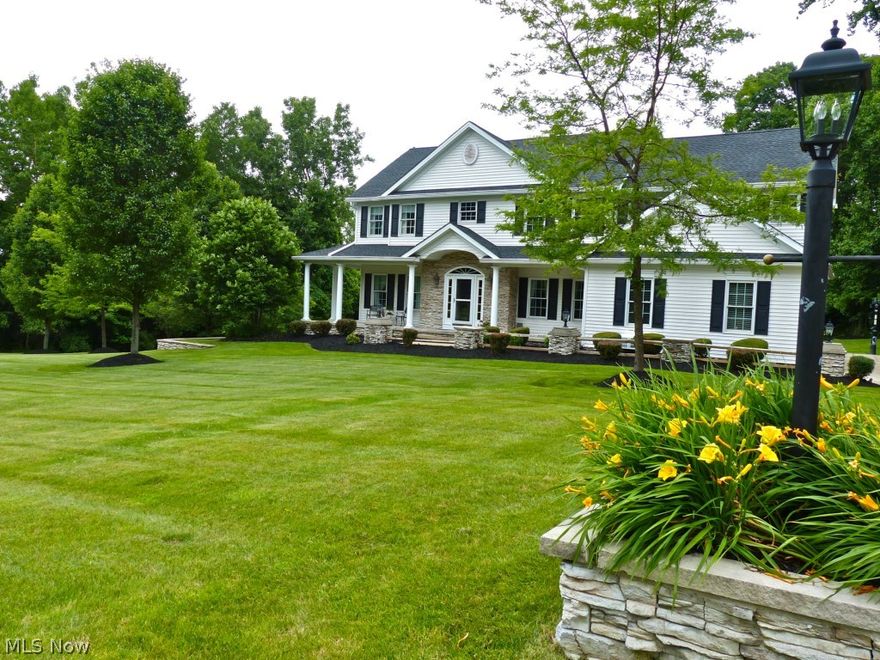 Impressive curb appeal in this stunning Cali Woods, stone enhanced Colonial w/relaxing wrap-around front porch, Meticulous landscaping & a 2.59 AC lot, 1st floor 9’ ceilings & inviting, tasteful décor make this spectacular family home turn key ready, 2 story HW foyer w/views of the open staircase which offers dual access, Parlor/living rm w/crown moldings & HW flooring, French doors to the office which is spacious enough for the whole family to work w/access door to porch & built in bench, loft/upper walkway overlooks the 2 story family rm bathed in natural light w/2 skylights & stone gas fireplace, formal dining w/warm wood flooring, beautiful state of the art Kit w/granite, ceramic, island, stainless hood, pantry, upgraded fixtures & octagon breakfast rm, 1st floor laundry & powder rm, Newer carpet, Vaulted Mstr suite offers a private rm for exercise or relaxing, His & Her walk-in closets & 15’ glamour bath w/tub & glass shower, 3 more bedrooms plus full bath (with unique hand painte