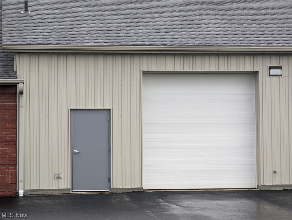 Opportunity knocks! If you are looking for heated, secure storage with an overhead door, you have found it. This space comes with a mini office as well. 20' by 27' heated garage and beautiful paved parking lot with plenty of space for vehicles.
