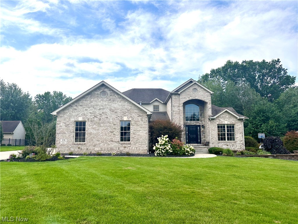 This STUNNING 3 bedroom, 3.5 bath residence features an open floor plan with a contemporary flare in a highly desirable Cortland neighborhood! The heart of this home is the two-story great room with maple hardwood floors, large windows, and double-sided gas fireplace to enjoy from the great room and the eat-in kitchen. The beautifully-updated kitchen boasts quartz counter tops, copper backsplash, cherry cabinets, wireless pendant lighting with Bluetooth, and all new appliances. The main level also includes a formal dining room, office space, and convenient laundry room. The first floor master suite offers a tray ceiling, walk-in closet, new carpet, and spacious attached bath with a jetted tub and custom shower. The second floor features a catwalk to two nice-sized bedrooms and Jack-n-Jill bath. Walk down into the basement to find an impressive custom bar with granite countertops and color-changing LED lighting. A lounge area, full bath, bonus room and plenty of storage space can also b