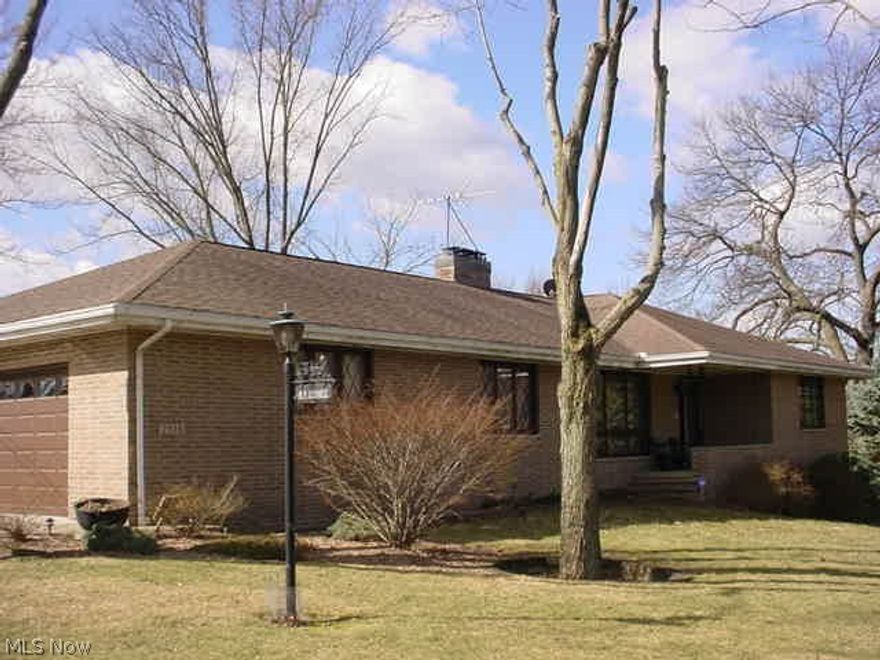 Custom built, one owner all brick ranch! 2090 sq ft all on main level! 3 bed, 2 1/2 baths (plumbed for 2 more in basement), eat in kitchen & formal dining, living room & family room! 2 fireplaces! Basement rec room with fireplace and walk out! 1st floor laundry, office, 7 pocket doors and slider to covered patio! 2010 new furnace & AC. Roof 2006. Pella casement windows. Whole house cooling fan. Security system. All appliances. Tons of storage in basement & work shop bench. Pull down attic with floor for storage. RV or trailer pad. City water & sewer. Double lot, 120 x 255. Master bath and double walk in closets and double sinks in main bath. One of a kind!