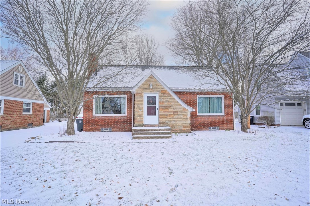 Welcome to this fantastic 1951 cape cod in the heart of the desirable West Akron area. As you enter, you are greeted with original hardwood floors through-out. The expansive living room has a huge picturesque window that brings in a ton of radiant natural light. The living room opens up into the kitchen and dining area, perfect for entertaining and/or family time. The stylish UPDATED kitchen offers plenty of counter space and soft close cabinets. The first floor is complete with an UPDATED full bath and two very roomy bedrooms. The second floor presents an enormous master bedroom with a sizable walk in closet and an UPDATED half bath. If that wasn't enough, the basement provides a substantial finished recreation room ideal for extra living space, office, work-out, or a crafting area. There is also a very spacious amount of space for all your storage needs. The 2 car attached garage enters into an ample breezeway that makes a terrific spot for a mudroom or even more storage. C