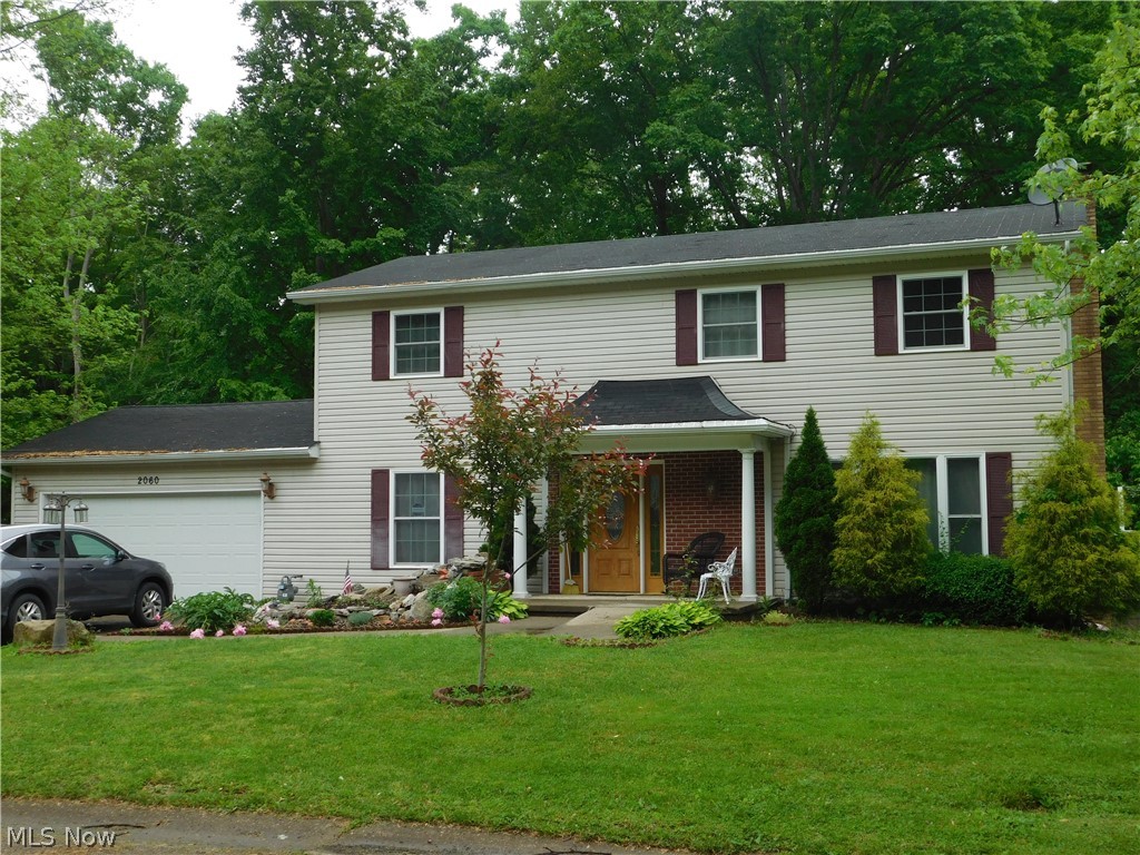 Located close to the High school this two story home offers an abundance of living space. The open concept on the main floor offers kitchen with bar, formal dining room, living room and half bath. Upstairs you will find 4 bedrooms including the master suite and 2 full baths. The lower level offers family room, bedroom, full bath and laundry. The home is handicap accessible with sidewalk ramp and chairlift. Home is serviced with city water and sewer, new natural gas furnace, some electric baseboard heat and central air. If you are in the market for a well cared for home this one will fit the bill. Property sells "AS IS".