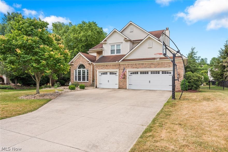 Backyard Oasis in NE Ohio?  Yes please! This home is stunning, and perfect for entertaining!  Grand foyer entrance welcomes you into the open living with fireplace and dining room, with soaring ceilings and new LVT floors. Eat in kitchen is a chefs dream with a huge island, updated counters, and stainless appliances. Kitchen is open to the large family room with a second fireplace and both the kitchen and family room overlook the *exceptional* back yard.  Private and full of mature landscaping, the yard offers multi level entertaining including a deck, a patio with stone fireplace, a cabana, hot tub and a glorious built in pool. You just have to see it, words don't do it justice!  Back inside you'll enjoy a convenient first floor laundry and half bath to complete the main level.  Upstairs are 4 huge bedrooms, all with great closet space! The primary bedroom is massive with a 3rd fireplace, walk in closet and spacious en suite bath.  It doesn't end there.  The fully finished lower level is incredible! Speakeasy vibes in this bar/theater room are amazing! Additionally the basement offers an office/workout room/bonus space plus a full bathroom.  This house really has it all! Top of the line furnace and AC new in 2021. Pool installed 2018, basement remodel 2021. Dont miss this one!