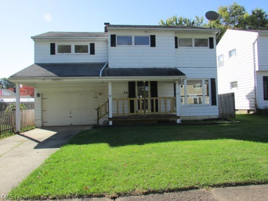 Spacious colonial with large master bedroom with master bath.  There are an additional 3 bedrooms (each with wood floors) and another full bath upstairs.  Living and dining rooms also have wood floors.  The private backyard is partially fenced and has a porch off of the garage.  Home needs some TLC but has great potential. Property sold AS IS. Equal housing opportunity. FHA insurable w/escrow.