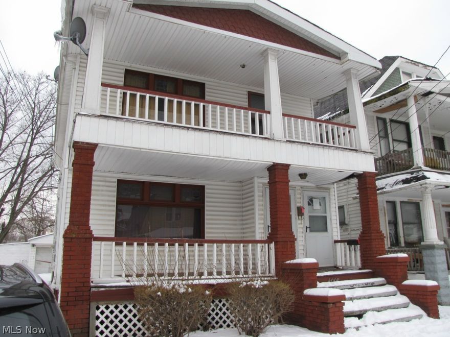 Solid duplex with beautiful woodwork in living and dining rooms.    Kitchens and baths need updating.    Plumbing vandalized.    Vinyl sided exterior with two car garage.   Being sold as is !