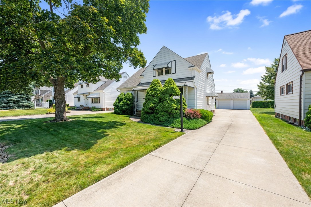 Endless potential awaits in this spacious 4-bedroom home full of charm and versatility! From the moment you arrive, you’ll be welcomed by its inviting curb appeal. Inside, the bright living room features a large picture window that fills the space with natural light. The eat-in kitchen offers neutral-toned cabinets, a double sink, and easy access to the covered back porch—perfect for morning coffee or evening relaxation. Enjoy the convenience of first-floor living with two comfortable bedrooms, each with generous closet space, and a full bath. Upstairs, you'll find two more spacious bedrooms with lofted ceilings, providing a cozy retreat or additional room to grow. The lower level adds even more functional space, including a recreation area, half bath, laundry, and plenty of storage. Step outside to a partially fenced backyard ideal for summer gatherings, complete with a covered porch and a detached two-car garage. Located just minutes from Jindra Park & Pool, shopping, restaurants, and with quick freeway access, this home offers both comfort and convenience. Put your personal touch on this home and make it your own. Home is being sold as is, with the buyer to assume POS violations.