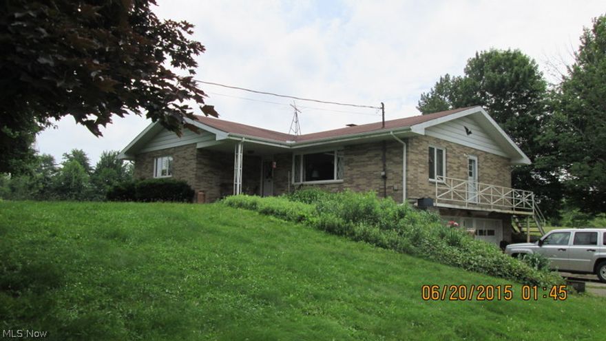 Horse, sheep Farm with 3 BR/1 Bath brick ranch situated on over 12 beautiful acres.  There are 2 fenced in pastures
(one is a hay field) plus approx. 6 Acres of woods.  Enjoy a large 1/4 Acre pond full of fish.  There is a 19 x 12 Barn plus
a huge shed.  This home boasts 3 large bedrooms, a large kitchen with lots of cupboards and the eat-in kitchen has a
wood burning fireplace for those cool evenings when entertaining.  The full basement is partially finished and it would
make a great family room or more bedrooms.  There is access from the basement to the large 2 car attached garage.
The pond and well are spring fed.  There is a water soft system but they are currently not using it.  What a beautiful
farm.  Won't last long!  Call today for an appointment.  This property is 5 miles from Conneaut, 5 miles from Andover
and 2 miles from Pierpont.