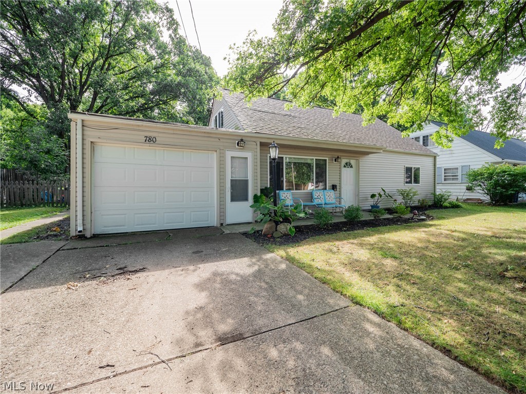 Cozy cape-cod style home with private backyard in the heart of Sheffield Lake! Welcome home to 780 Irving Park Blvd, featuring 4 bedrooms, 1.5 baths and an attached 1-car garage. As you enter you are welcomed in to the inviting living room with newer vinyl plank flooring. There is a dining area off the kitchen which also leads you to the spacious, fully fenced-in backyard with patio and plenty of space for gardening. The kitchen features updated stainless steel appliances, granite countertops and ample cabinetry storage. The laundry room, full bath and two spacious bedrooms (one currently being used to breed frogs) completes the first floor. Upstairs you will find two additional bedrooms and a half bath. Close proximity to the lake, community center, schools, parks and more!