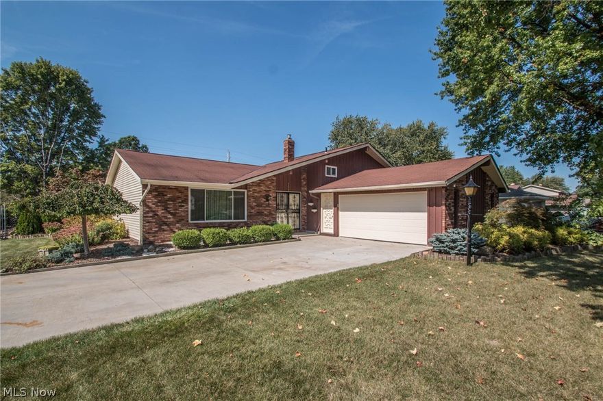 UPDATE:: Sellers have recently removed the wallpaper shown in images... In the hallway and half bath. MUST SEE the changes!!!!!
Large Split Level Home situated in a convenient location! Many updates included, New carpet throughout, Renovated main bathroom in 2016, New Furnace and A/C in 2016, Newer Roof, Exterior of home freshly painted 2017, New dishwasher, newer windows installed in the entire home, New garage door. Driveway has been re-paved and widened. This home features a main floor living room, dining room and eat in kitchen giving you access to the back porch/patio. The fully fenced-in back yard gives you privacy to enjoy your time spent in the outdoor gazebo and children's play house.  Three bedrooms and a new, renovated full bath are all located on the second level. Walk down to the additional living space in the lower level to find a spacious family room with a cozy fireplace. Also on this level is a bar, great for entertainment purposes, a study/library, the laundry room a