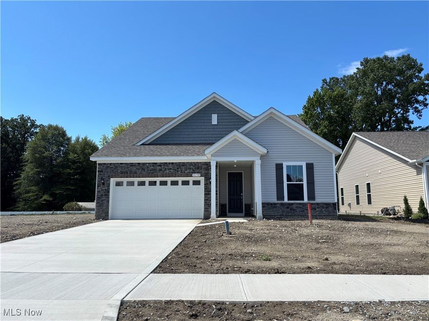 Welcome home to easy living in the stunning Prestige home! This ranch-style, new construction home features 3 bedrooms and 2 ½ baths, and an open floor plan.  Plenty of windows flood your home with natural light.  The open concept kitchen is a chef’s dream, boasting crisp white cabinets and elegant dark gray granite countertops.  The spacious owner's suite features an en suite bath with double sinks, tiled shower, and 2 large walk-in closets. And there is an additional first-floor suite with en suite bath and walk in closet that is ideal for guests. Enjoy the convenience of a first-floor laundry room and a two-car garage.  The covered patio off the back is perfect for relaxing or entertaining, and you can rest easy knowing that lawn maintenance and snow removal are provided for you. There’s also a large walk-up storage area for all of your extra needs.  Don’t miss out on this perfect blend of comfort and style! Amenities include a pavilion, walking trails, and community gardens.  Close to parks, restaurants, shopping, and easy freeway access to Routes 2 and 90.