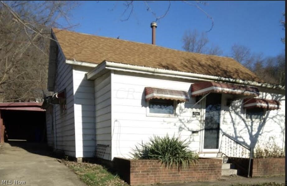 Great Investment property, right around the corner from Shopping & Hocking College. Charming lot with fenced in back yard, dog run, carport, lots of storage space. 1st Floor Owner Suite. It's all cleaned out and ready for you to put in some elbow grease & start making this lovely cottage style home come to life again. Annual taxes only 1K. Appraised at $59K. Priced to sell. Being sold AS IS. Seller financing may be available with acceptable terms.