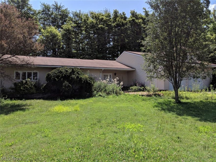 A three bedroom two bath ranch located on just over a half acre! Large kitchen that leads to a living room and dining room.  Generous sized rooms and the master bedroom offers walk in closets and it's own master bathroom. Wide door ways and hallways to make moving items much easier! Slider patio along with an enclosed porch that lead to the private patio and back yard. An attached 2 car+ garage and concrete drive. Make this home your own!!!!