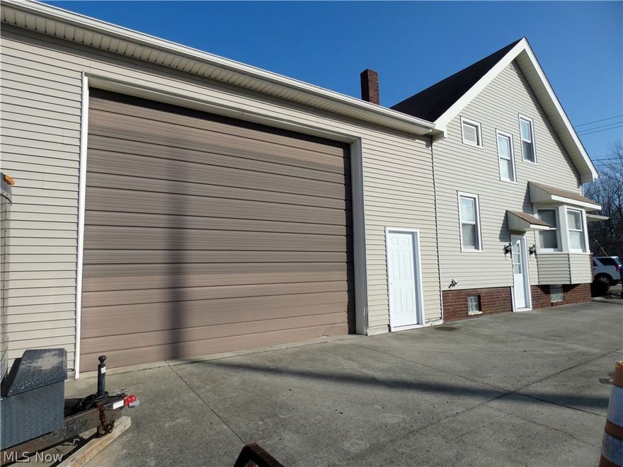 Free standing home converted to office space. This was gutted to the studs. Newer Electric and plumbing . HVAC 2019, Roof 2015. Office has 1 full bath on second floor  1/2 bath on first and half bath in lower  level. Huge warehouse addition with two 15' overheard doors size is 40 X 32 feet. You can store up to 10 cars inside. This is great for car buffs, Landscaping company HVAC company. Construction company. The lot extends back behind trees it is  a  60 x 760 1 acre commercial lot.