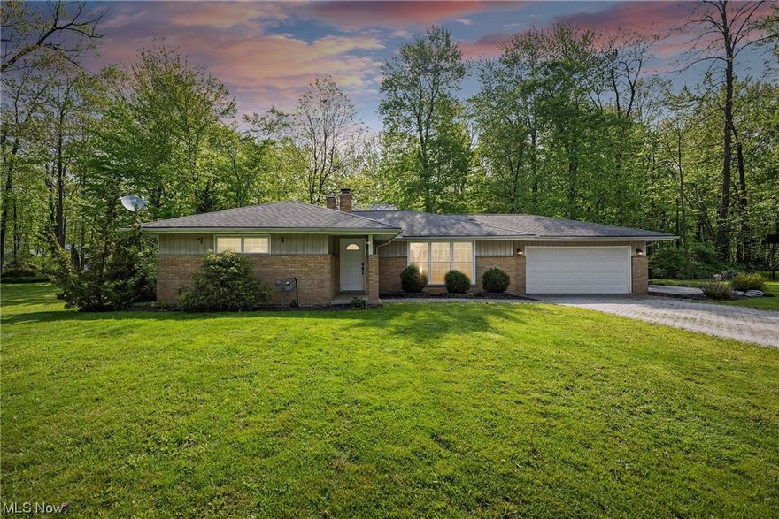 Welcome to this beautifully updated ranch in the highly desirable Willoughby Hills area! Through the front door you will enter the foyer which is the perfect place to hang up your jacket and remove your shoes before entering the bright and airy living room with new flooring, new large picture window and cozy fireplace. The eat-in kitchen is completely remodeled with stainless steel appliances, granite countertops, a large island and plenty of space for a breakfast table and desk. With three bedrooms you have options to convert one or more to an office or playroom, whatever fits your needs! The bathroom has been remodeled with a tile surround tub and updated fixtures. Outside you can enjoy the well maintained landscaping, patio for summer BBQ's and the newly rebuilt shed for all your outdoor tools. The garage has a new brick floor and door with an opener. Other updates include: brick driveway, water tank, and new paint throughout.