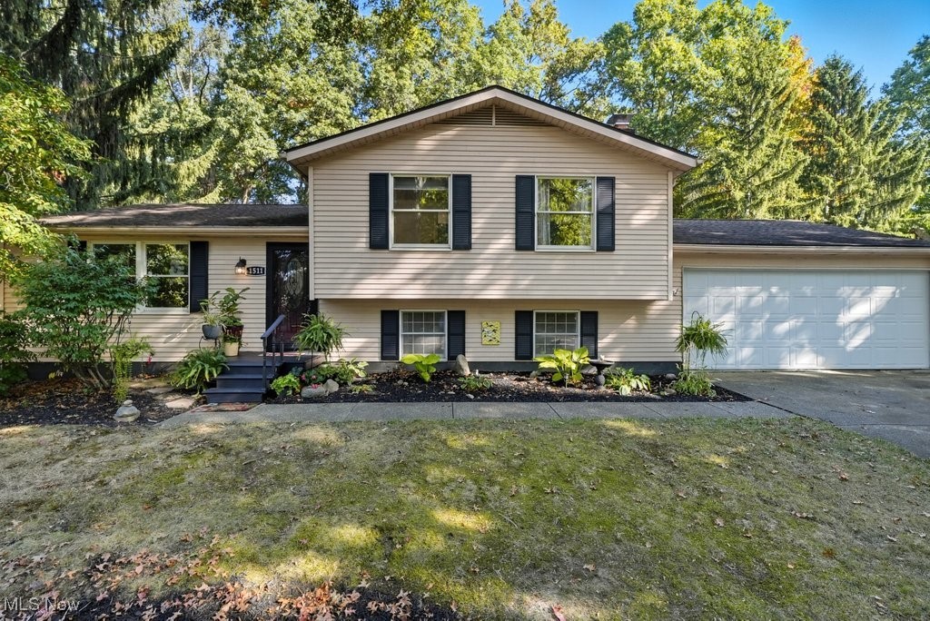 Welcome to this 3-bedroom, 2-bath split-level home in the heart of Stow! Step inside to find roomy living spaces filled with natural light and a spacious kitchen perfect for cooking, entertaining, or gathering with family. Upstairs, you’ll find three comfortable bedrooms and one full bath.
Out back, enjoy your privacy! The large, fenced-in yard offers plenty of space to relax or play, with wooded surroundings that create a peaceful, nature-filled backdrop. A deck extends your living space outdoors—ideal for summer barbecues or quiet mornings with coffee.
With its blend of comfort and privacy, this home is ready to Welcome you!