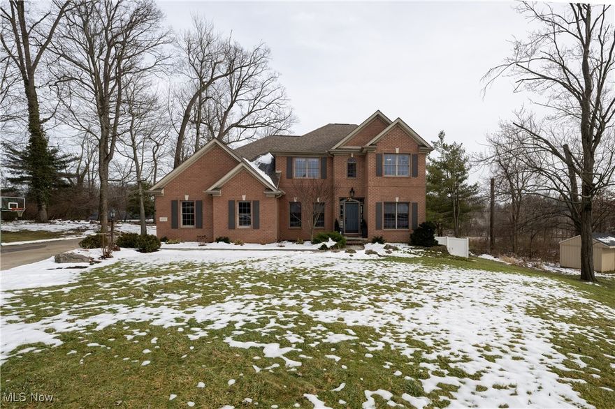 This is a WOW! This gorgeous home not only comes with a double lot but it's situated beautifully on a cul-de-sac in Jackson Township. Who doesn't love this beautiful kitchen with open space into the the great room? The spacious kitchen has no shortage of cabinets...pantry included, along with stone counters and stainless appliances. Just around the corner (c'mon Spring) you will be able to enjoy the large second story deck right off the kitchen and be the envy of your friends and family.  All four bedrooms really have wonderful closet space, TWO have walk in's.  The primary bathroom offers dual sinks, separate tub and shower and plenty of space in between. The second full bath offers dual sinks and stone counter top and there is  plenty of closet space on the second level. HUGE family room hosts a wood burning fireplace, walk out to  patio area and a half bath. A bonus feature to this amazing home is an outdoor storage space  with French doors for your mower and all your gardening needs right in your back yard.
Don't be fooled...many updates have been completed!  Freshly painted walls, new carpet, new smart door handles front door and garage door, new outlets and covers, chandeliers, dining pendant lights, bathroom vanity, sink, faucet, light, and mirror in the main floor half bath, master bath faucets, ceiling fans with remotes, doorhandles, new refrigerator, new garbage disposal, new over the range microwave, landscape stones around the trees mailbox and flowerbeds, beautiful 6 foot vinyl fence with two gates, garage floor epoxy and a basketball hoop WHEW All this home needs is you!