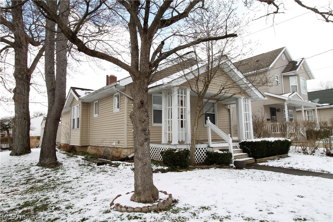 Welcome home to this charming two-bedroom, with a possible two more bedrooms in the basement, and two full bath ranch home. Come on up to the covered porch and into the large living room offering a fireplace with mantle, new carpet throughout and is open to the dining room with window seat and built-in drawers, ceiling fan. The kitchen has new countertops, and new flooring. There are two bedrooms on the main floor with new carpet and a full bathroom. The finished basement offers two more bedrooms with new carpet and a full bathroom. There is a detached one car garage. There is a new rear roof, new lights, freshly painted throughout, furnace just serviced. Prescious memories begin right here!