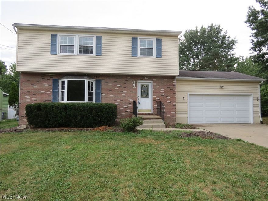 Charming colonial with a country feel.  Boasts a large, enclosed backyard with lots of greenery for privacy. Spacious living room and dining areas with new carpet.  Lots of natural light throughout the house.  Year-round sun room overlooks beautiful backyard.  Four spacious bedrooms with plenty of closet space, full bathroom upstairs with an updated half bath on the first floor.  Ample storage space in two car attached garage and full unfinished basement.  A must see!