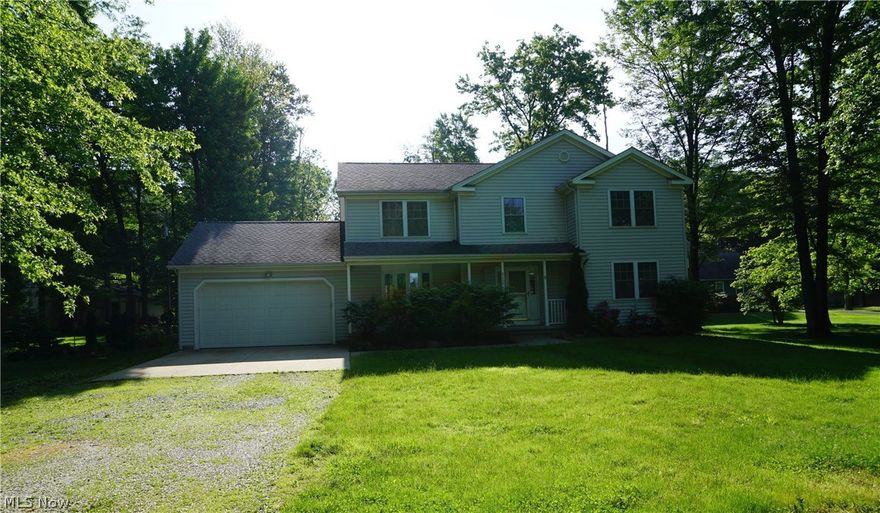 If you are looking for a large house with a great lot (over 1 acre) then this is the house for you! The exterior features a nice size covered porch as well as a deck, underground utilities, and a large portion of the yard has invisible fence (front and back). The oversized garage has an additional 8 ft. workshop area on the back as well as an additional rear overhead door. The interior has a large eat-in kitchen, and there is also a formal dining room. The spacious living room and family room both have fireplaces. The upper level has a large master suite, 3 generously sized additional bedrooms, a laundry room as well as 2 attic spaces for additional storage. The full basement is partially framed and is waiting for your finishing. Don’t miss out on this one! Sold as is. Buyer to assume any/all city POS violations.