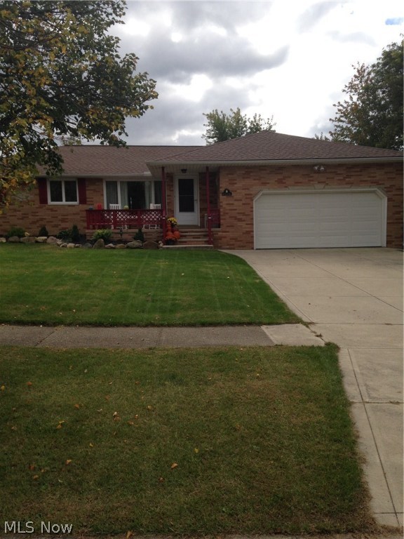 This Home is so well kept! You will completely enjoy viewing this home. This 3 bedroom 1.5 bath brick ranch is lovely on the inside and the outside. Notice the great front porch as you enter the home. It has plenty of room for outdoor furniture. A wonderful place to relax. The living room is very spacious and has new carpeting and is freshly painted. It flows nicely into the formal dining room. The kitchen has been totally updated with laminate flooring and new counter tops as well as new cabinets. There is a family room off of the kitchen which has sliders that lead to the back deck and fenced backyard. All the bedrooms are on the main level as well as both bathrooms. The basement is huge and has so much potential to finish. The 2 car garage is attached for your convenience. Roof 2011 driveway 2011. Electric panel 2013