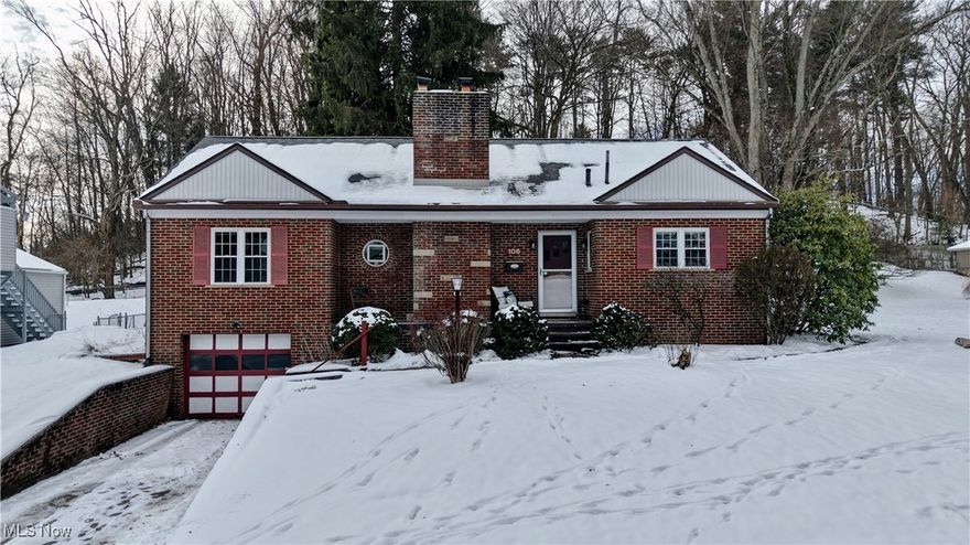 Charming all brick home with amazing views of the wooded lot, where you can watch sweet deer coming through the backyard in the Springtime. Such a picturesque setting! Living room offers a large picture window for natural light and a gas fireplace. Dining room and the bright kitchen with new sink has plenty of room for entertaining. There are two Bedrooms, and a full bathroom on the first floor. Paned wood door to the large partially covered deck where you can sit out to enjoy the views or entertain. Upstairs you have another bedroom with a skylight and built in drawers. The partially finished basement has a half bath, family room with a woodburning fireplace, laundry area, and plenty of storage. Radon (2019). This home is in the heart of North Canton. Conveniently located to local amenities, schools, shopping and major routes. Nothing to do but move in!
