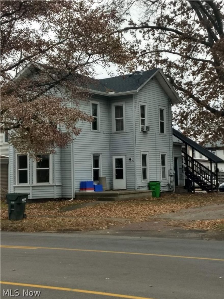 Vinyl sided duplex in convenient Orrville location.  Upstairs unit currently rents for $700/month.  Downstairs unit is currently vacant and gutted to the studs.  Ample parking behind the duplex means very little grass/yard maintenance.  Owner pays Orrville Utilities bill for upstairs unit.  Orrville Utilities is one bill covering water, sewer, electric and trash.  A great opportunity to have a like new rental with some sweat equity.