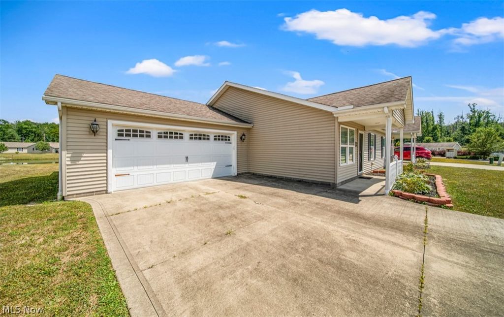 Photo of 309 Woodland Way #A, Jefferson, OH 44047 (MLS # 5206431)