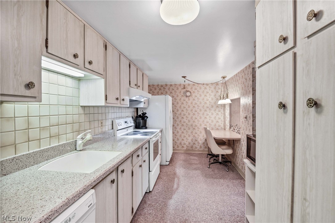 Tudor House Condo - Residential