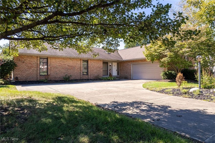 Welcome home to this expansive 4-bedroom, 3.5-bath ranch offering comfort, style, and plenty of space for everyday living and entertaining. Step inside through the welcoming foyer and be greeted by an inviting great room, complete with a cozy gas and wood-burning fireplace. The massive eat-in kitchen is truly the heart of the home—featuring granite countertops, stainless steel appliances, and abundant cabinetry. A bright sunroom just off the kitchen is the perfect spot for morning coffee, while the elegant dining room is ready for gatherings both large and small. Retreat to the sprawling master suite with its own fireplace, luxurious en suite bath, and a custom walk-in closet designed with storage in mind. First floor laundry for convenience. The finished lower level is a true bonus—offering a theater room, rec room, gaming area, workshop, and a convenient half bath. Additional storage is available with a crawlspace in the basement. Outside, enjoy the serene backyard setting, complete with a hot tub (negotiable) and plenty of space to relax or entertain. An attached two-car garage provides convenience and practicality. Located in desirable Plain Township, this home combines comfort, luxury, and versatility—all in one exceptional package.