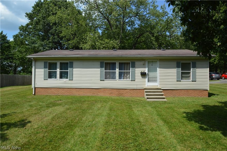 Charming Home on a Beautiful Corner Wooded Lot in the Liberty SD. New Carpeting installed August 2019. Washer and Dryer included. Large Detached 2 Car Garage. 2 A/C Window Units included with property. You do not want to miss this home!