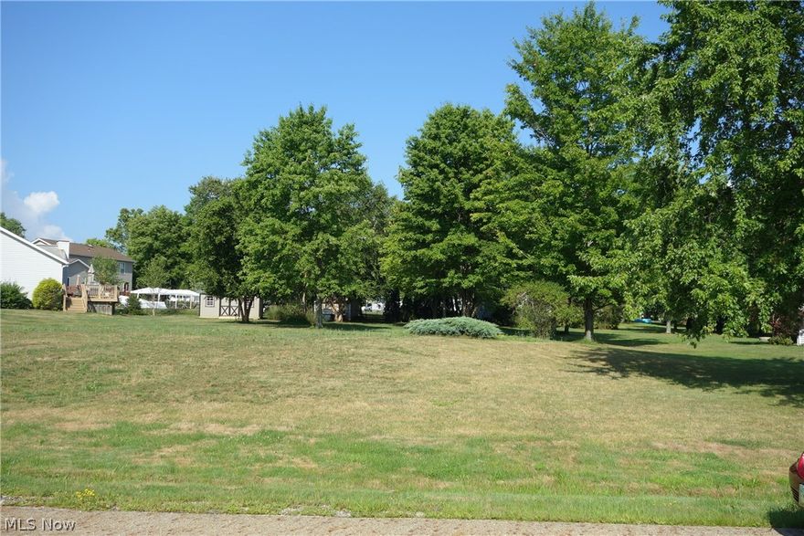 Pie shape, level lot in the existing area. Convenient location to Route. See attachment for layout.