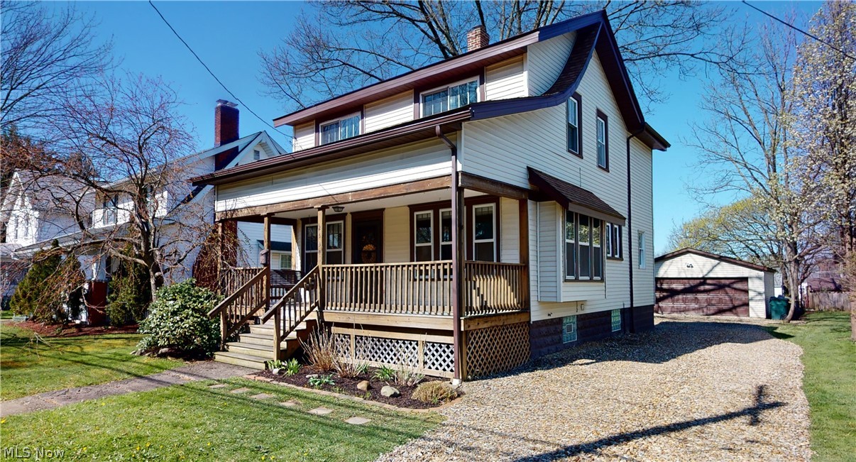 Classic Cuyahoga Falls Colonial, in the heart of the city, waiting for YOU to call it HOME!! Approach the front door... you can't ignore the WOW factor that is the Front Porch, spanning the width of the home and complete with a Bench Swing! Enter the front door to a rare combination of Character and Updates, Charm and Features; A Carpeted Living Room makes way to a Dining Room outfitted with Original Hardwood Floors and Trim, Highlighted by a Window Seat that is nothing short of Magnificent. In to the Kitchen where you'll find updates that include Quartz Countertops and Hardwood Cabinets featuring Soft-Close doors and drawers. Off the Dinette, the main floor is complete with a Half Bath for your convenience. By Now you've noticed the 9 Foot Ceilings throughout the entire first floor! The second floor houses all 3 bedrooms, including a Master Bedroom with Vaulted Ceilings, (the size of which is truly unique for a home of this age). A Full Bath on the second floor was updated in 2016, an