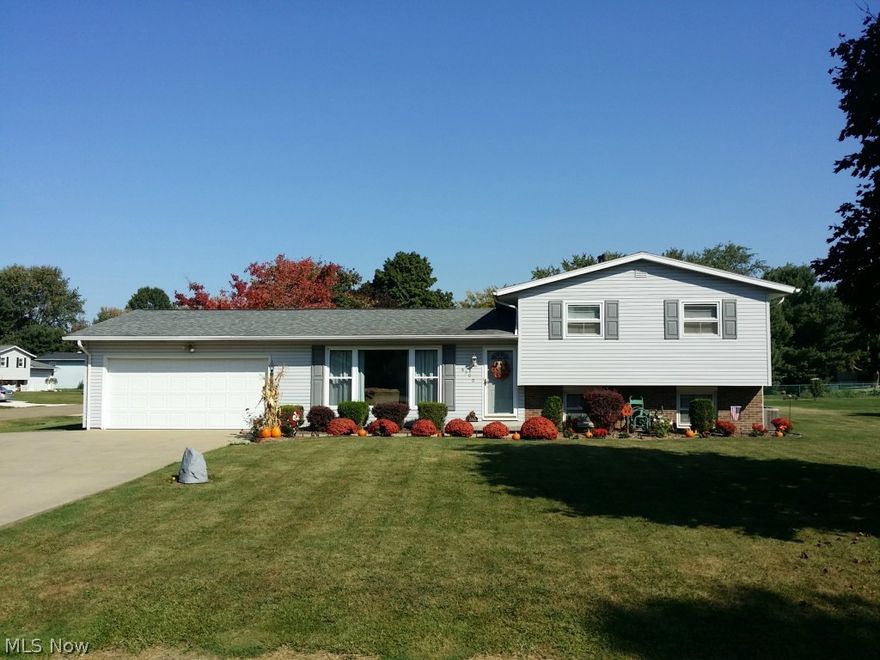 This has a kitchen your friends will envy.  Quartz countertops and many built- ins is like your own cockpit with everything at your fingertips! The kitchen is open to the dining room which will make it fun to entertain loved ones! Dining room is open to the living room which is open to the lower level family room. Dual sink, tiled bath with built in linen towel cabinet as well. Walk out from the dining room to a refurbished deck over looking a expansive size yard and custom dream shed. Driveway features a U shape turn a round. Updated mechanics makes this home turn key, just move right in