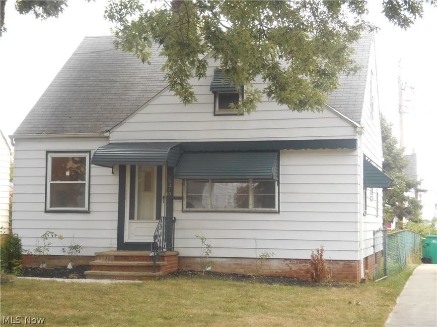 Schedule your tour of this cozy, move-in ready Maple Heights bungalow today.  You will be kept comfortably warm during cold winter nights by the Carrier Furnace.  The professionally finished hardwood floors are a home buyer's delight.  Feel free to finish the spacious basement to your specifications.  The owner recently replaced a portion of the sidewalk.  The seller has also made the home point of sale compliant and included a home warranty.