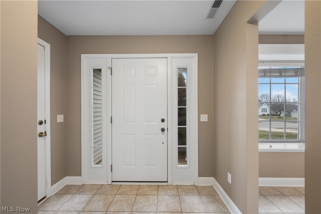 Photo of 1458 Chesapeake Avenue, Louisville, OH 44641 (MLS # 5191011)