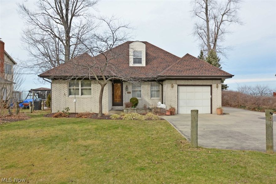 Direct lakefront paradise awaits you! Imagine beautiful sunsets with your friends and family. You've always wanted to live on the lake, here is your chance! This custom cape cod features a spacious, open floor plan with an abundance of windows overlooking Lake Erie. Two full size sliding glass doors on either end of the full brick fireplace open to to separate rear decks; each with stunning lake views. Huge gourmet kitchen has custom cabinetry, tons of cabinet and counter space, two full sinks and is open to the great room. Layout is perfect for parties and social gatherings! Home features first floor master bedroom with enormous walk in closet and large glamour bath. Two large bedrooms upstairs have great lake-views and share the second full bath. Upgrades include, new furnace in 2010, new roof in 2012 and new carpet in living room in 2012. This home has direct lake access! Stair case to the west end of the property takes you down to the cement capped break wall at the waters edge! Pe