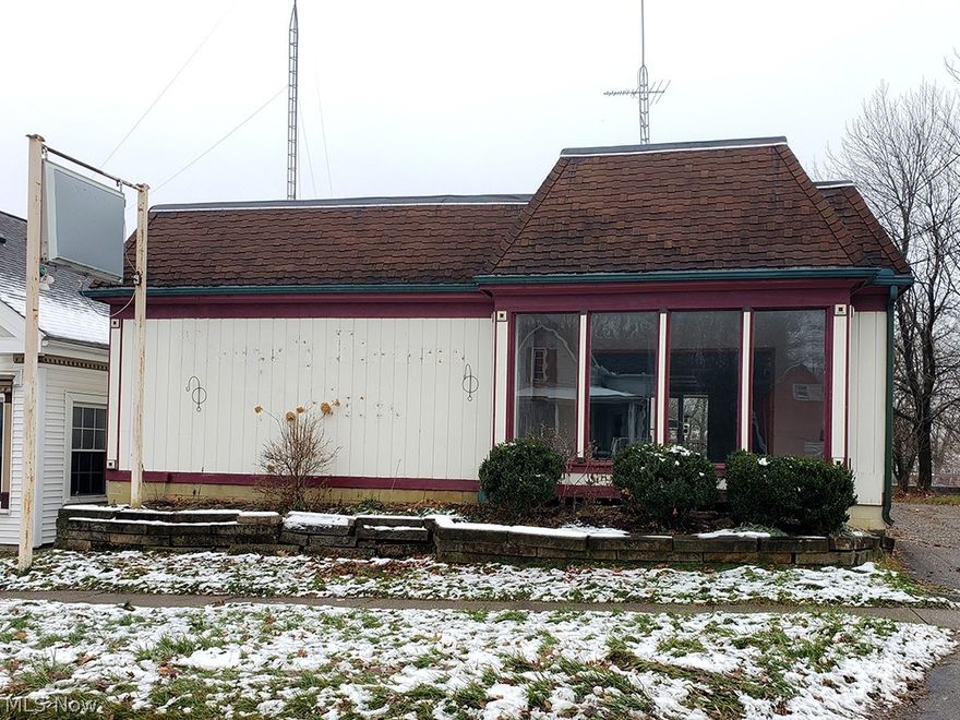 Great opportunity for the budding entrepreneur! This building is now a clean slate for your business and could serve so many industries. Main level was previously a gift shop and features lots of natural light, vaulted ceiling, work room, restroom and a walk-in cooler (which was used for flowers and can be removed). Similar to a split level home, there is an upper level and a lower level off the main showroom. The upper level was used for office space. Owners built a wall between the once large space to section off private offices. This wall can be removed. It is non supportive and does not have electricity running through it. The rear upper office has a great view through the large windows. The lower level has an employee entrance which is great for shipping/receiving. It also has a 1 car garage and storage room with the furnace and security video equipment. Down the next set of stairs is a large unfinished basement space with sump pump and hot water tank. Could be used for storage. B