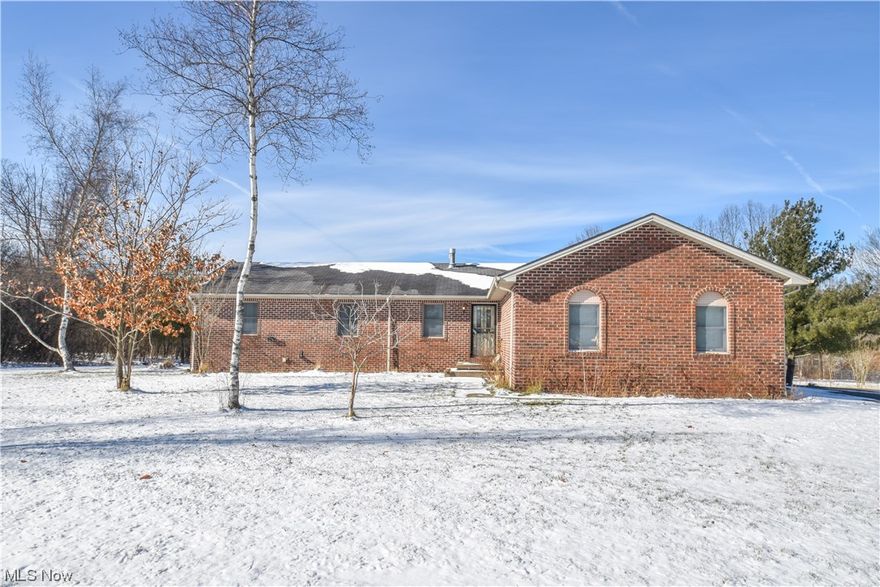 Are you looking for an amazing brick ranch on a little over an acre in Canfield Twp, Canfield schools? Meticulously cared for and loved for years.  Look no further, this is the home for you!! One owner beauty built in 1995 that offers a split bedroom design with the owners suite including a walk in closet, full bath and a large bedroom on one side of the house and the other side has two additional bedrooms with a full bath. Huge kitchen with appliances included and it is open to the dining room/dining area that has a slider to the deck. The spacious great room/living room  boasts a lovely gas fireplace with a beautiful mantle. Full basement with walk up to the back yard.  Basement is ceramic tile and features kitchen, laundry area and a 3rd full bath. 2 plus car attached garage with additional room for storage, floor drain, hot and cold water with a utility sink. Detached garage with two sliding doors on the side that open into the gorgeous back yard. City water and Septic which has already been inspected by Mahoning County and has passed.  Don't miss out on this gem, make an appointment today.