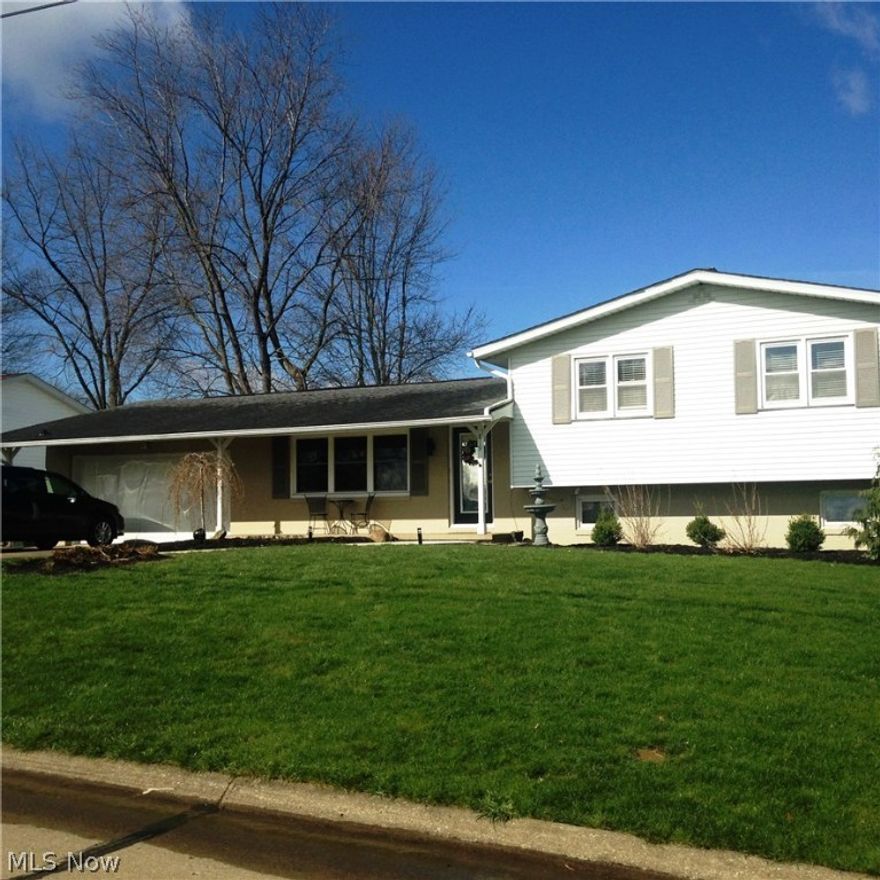 Beautifully updated end split with fully applianced kitchen included.  Tastefully decorated, with hardwoods most all of the house.  Second level has updated main bath and three bedrooms.  Lower level includes second full bath, large laundry room with additional storage, and a family room with woodburning fireplace.  Outdoor living with porch, paver deck and fire pit.