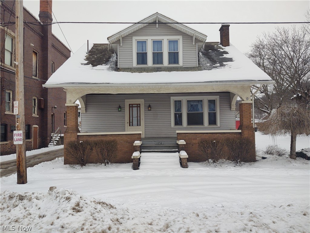 Step back in time when you walk in to this home. Upstairs you will find all of the original hardwood flooring while the downstairs features a built in ironing board, built in book cases, the original hardwood french doors closing off the dining area and so much more of the original woodwork throughout. Some newer features have been added as well to include updated windows, new ductwork and two new sump pumps. The basement was waterproofed in 2000. The front foyer gives you enough space to come in out of the weather and settle in before going about your day. The mud room/laundry room is conveniently located just off the back door. You must see all this 3 bdrm home has to offer to truly appreciate. Oh, did I mention the large deck and 2 car garage out back!