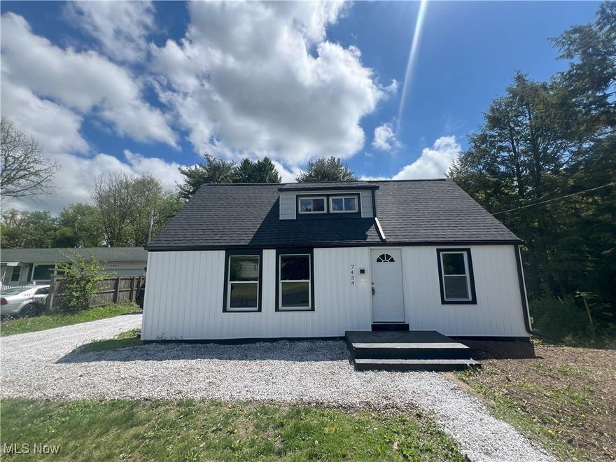 This stunning bungalow, fully remodeled in 2025, is located just outside the desirable Pembroke neighborhood and within the GlenOak School District. Every detail has been thoughtfully updated, making this home completely move-in ready. The renovation includes a brand-new roof, gutters, siding, double-pane vinyl windows, furnace, air conditioning, and hot water tank. Inside, you'll find fresh paint throughout, new carpeting, and durable laminate flooring. The bright eat-in kitchen features all-new white cabinetry, perfect for both everyday meals and entertaining. Offering three bedrooms, including one conveniently located on the first floor, this home also includes a newly updated full bathroom on the main level. The first floor provides additional flexibility with a dedicated office area, ideal for remote work or quiet study. Step outside to enjoy a large, freshly painted back deck—great for relaxing or entertaining. A new gravel driveway adds charm and convenience to this already impressive property. With all the major updates completed, this home is ready for you to move in and start making memories.
