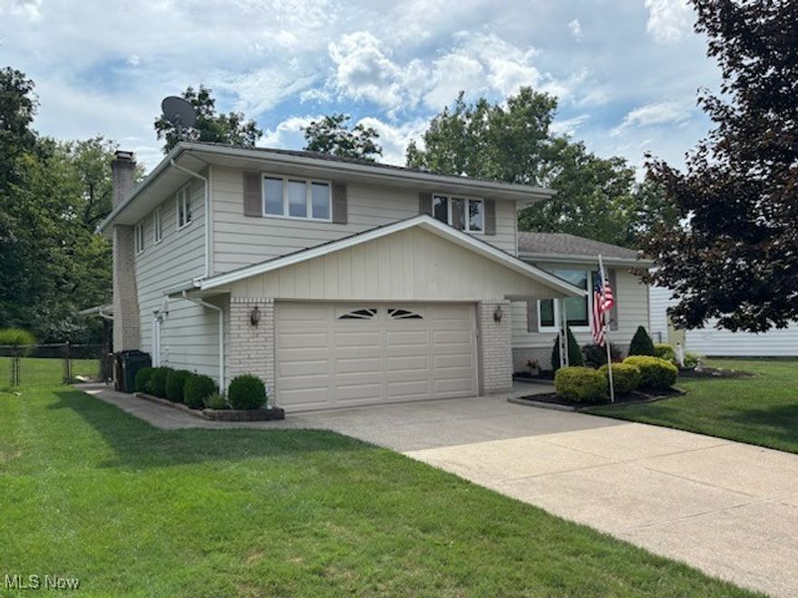 This solid well-maintained split level home is located in the heart of Parma - within walking distance to the newly renovated Ridgewood Golf Course, shopping, dining, and library. The long-time owners have taken great pride in the property and it shows! This spacious home features 4 generously-sized bedrooms, 2 full bathrooms, and a basement shower for added convenience. Plenty of room to spread out - from the large living room to the spacious family room with cozy fireplace and a partially finished basement. The highlight of the home is the large covered back patio, perfect for outdoor gatherings - rain or shine - overlooking a large fenced-in backyard. Beyond the fence, the yard extends to the creek, offering plenty of space on the expansive 1/3-acre lot. Additional features include a roof replacement in 2009, a new hot water heater in 2025 - and absolutely gorgeous wood doors and trim throughout the home. The attached 2-car garage, with a newer door and access code, ensures you’ll never have to worry about shoveling snow off your car again! Set in a fantastic neighborhood and prime location, this home offers the perfect opportunity to add your personal touch. Parma also offers a large community pool and park, and tons of other amenities. Make 7130 Lakeview your home for the holidays! [Room measurements are approximate. Some photos are staged.]