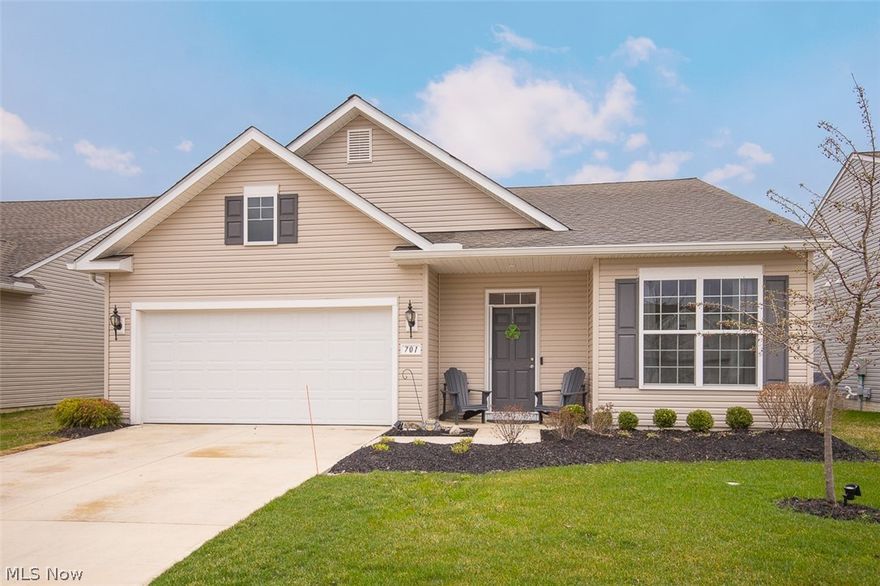 Welcome to this beautiful two-bedroom, two full bath ranch located in the desirable 55+ neighborhood, Four Seasons at Chestnut Ridge. Built in 2022, immediately feel at home with the neutral interior and cozy plush carpet in the spacious living room. The open concept kitchen and living room is the perfect set up for hosting parties and gatherings. The eat-in kitchen is equipped with stunning dark wood cabinetry, a double sided stainless steel sink, and a spacious island overlooking the living room. The primary bedroom has a large walk in closet and the ensuite bathroom has vinyl flooring and walk in shower. In addition to the second guest bedroom, you will find the perfect flex space with gorgeous built ins custom made by Closets by Design. It is currently being used as a dining space but could be a perfect office or doored off for a 3rd bedroom. 
The garage has a built-in workshop with A/C and extra electrical for those many projects. Or if needed, the wall can be removed for your full 2 car garage. Don't miss the gorgeous back patio perfect for cozy nights outside. Create shade or sun with your lovely louvered pergola!
Enjoy the amazing community and have use of the pool and tennis courts. Social events and community engagement are a huge bonus! Set up your showing today!