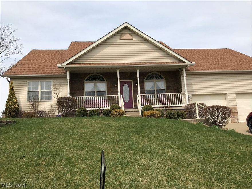 This is it! Great curb appeal with covered front and back porches! Fenced yard with black chain link fencing and an adequate storage building. Beautifully landscaped and with a nice high ceiling garage! Stunning windows that let the light inside. Foundation is covered in attractive stone and the inside fireplace matches. Walk into the foyer and notice the hardwood floors leading to the living space, to the right the formal dining room to the left the executive office move on forward into the cozy great room with gas stone fireplace and french doors.  The near by kitchen has oak cabinets with quartz counter tops and YES an island and pantry, appliances will stay! Right off the kitchen is an eating nook or you could use the kitchen bar area.  The master bedroom is large with a vaulted ceiling and the large master bath has double sinks, jetted tub and separate shower.  The laundry room is also handy to this side of the residence.  Moving down the hallway their are two nice sized  bedrooms