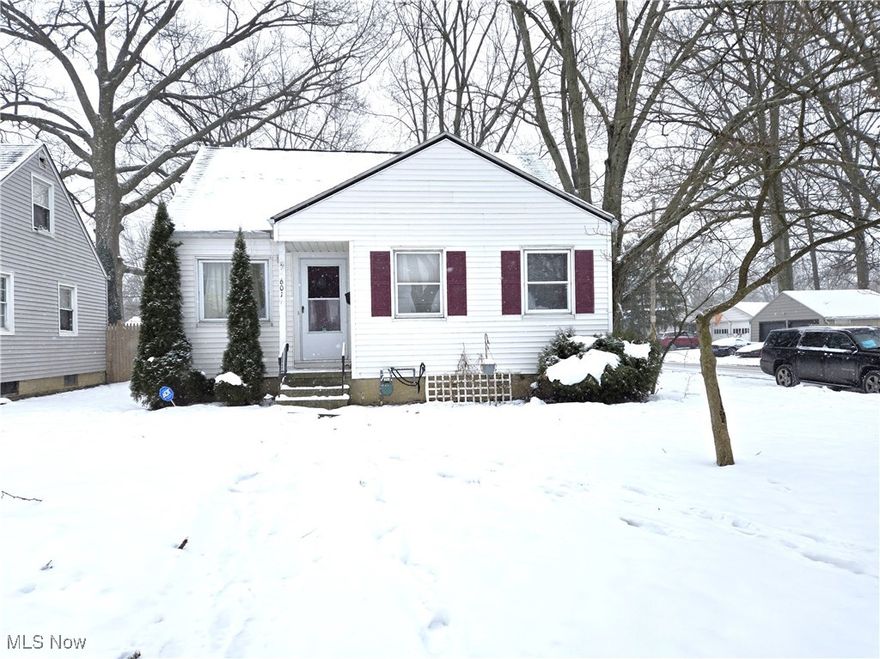 Welcome Home!  This Cape Cod house is located in the Eastern Heights neighborhood of Elyria.  Your house offers 3 bedrooms with 2 being on the main floor and the large main bedroom is on the second floor.  The refrigerator, gas oven and microwave oven all stay.  The full bath has a whirlpool style tub and this is also on the main floor.  Off the kitchen is a cozy spot where you can sit down and enjoy your meals.  The large living room lets you relax and sit back and watch your favorite shows.  The basement has been fully water-proofed and is normally used for entertainment that includes a bar area!  There is also a large area for the laundry room and lots and lots of storage.  Make an appointment to see this house with its wood fenced-in backyard and detached garage.