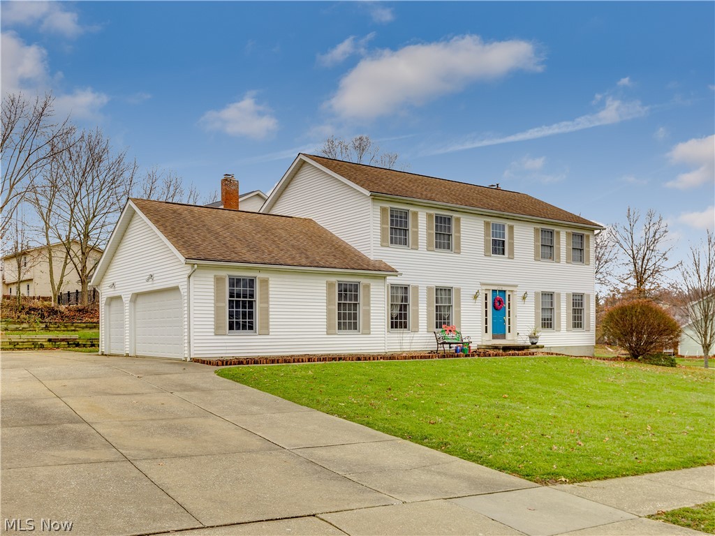 Welcome to 2876 Williamsburg Circle. Located in the desirable Partridge Highlands Development, this impressive 4 bedroom 2 full 1 half bath Colonial has everything you are looking for. Upon entering the front door, you are greeted by the large two-story foyer and the glistening wood flooring that spans the entire first floor. From the foyer French Doors lead to a roomy formal living room. The six panel pocket doors divide the living room from the family room and allow for privacy or a more open concept. The spacious kitchen boasts stainless steel appliances, Corian countertops, seamless sink, a sizable island and an oversized pantry. The kitchen opens to a stunning family room that includes a wood burning fireplace that is flanked by fireside windows and window seats. A formal dining room is directly off the kitchen. Surrounded by windows allowing for lots of natural sunlight, the 4-season room is the perfect private retreat. New carpeting, 3 nicely sized bedrooms, a full bath plus